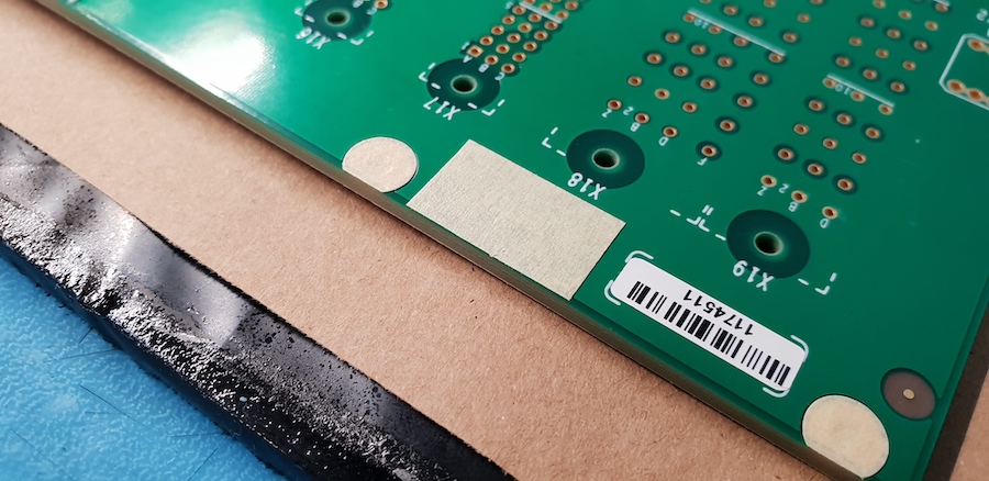 Pre-cut masking shapes for conformal coating